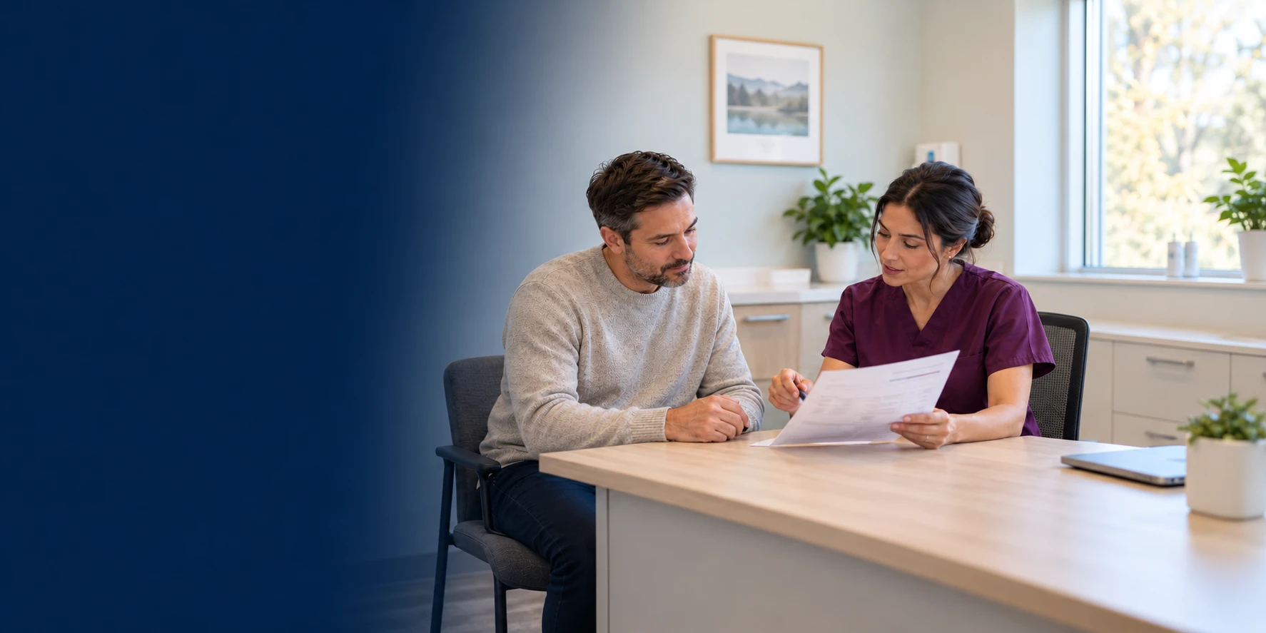 An adult patient and a clinician discussing a printed laboratory report at a consultation desk.