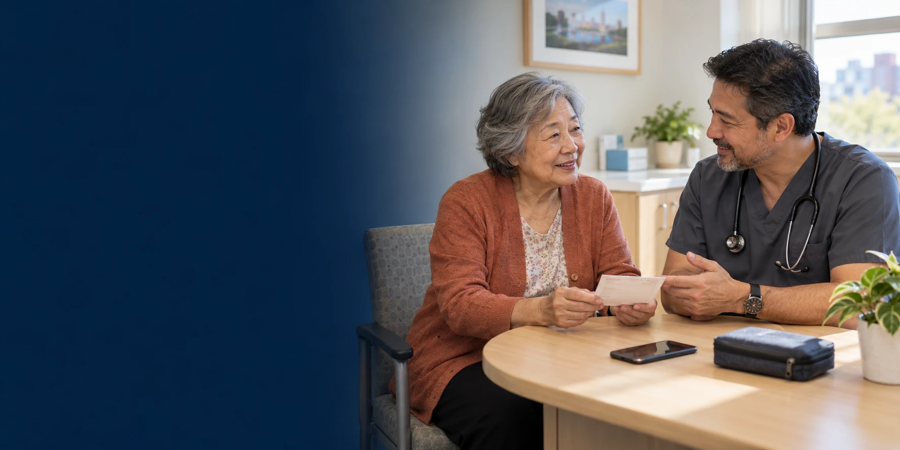 A woman and a clinician discussing a paper appointment card at a desk with a smartphone.